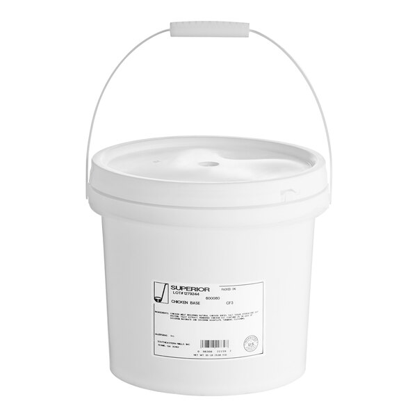 A white bucket with a lid and a handle containing Better Than Bouillon Premium Roasted Chicken Flavor Base.