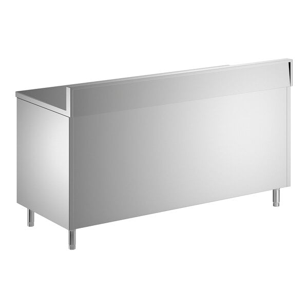 A stainless steel enclosed base table with sliding doors, a midshelf, and a 6-inch backsplash.