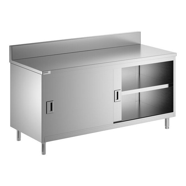 A stainless steel enclosed base table with sliding doors, a midshelf, and a 6-inch backsplash.