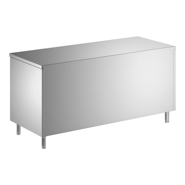 A stainless steel enclosed base table with sliding doors and a midshelf.