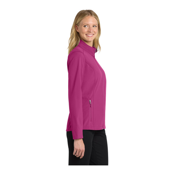 A close-up of a Port Authority Very Berry soft shell jacket for women.