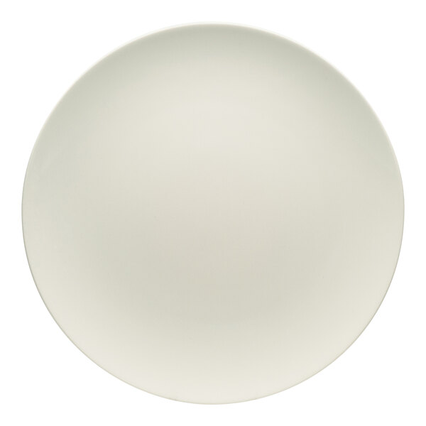A Bauscher Hepp Purity white porcelain coupe plate with a round rim.