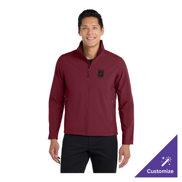 A maroon unisex soft shell jacket with a front zipper and customizable options.