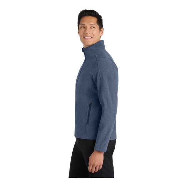 A man in a navy heather Port Authority Core Soft Shell jacket.