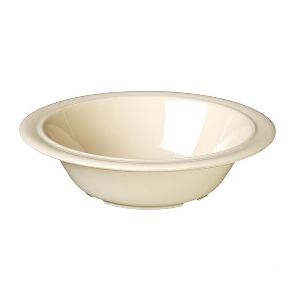 A white bowl with a tan rim.