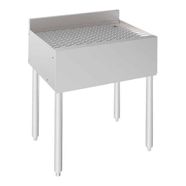 A Krowne stainless steel underbar drainboard with a drain.