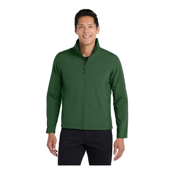 A man wearing a forest green Port Authority Core Soft Shell Jacket.