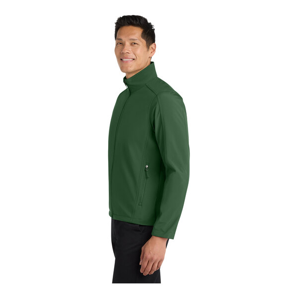 A man in a forest green Port Authority Core Soft Shell Jacket.