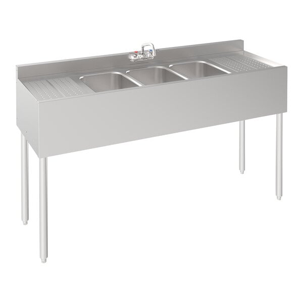 A Krowne stainless steel underbar sink with 3 bowls and 2 drainboards.