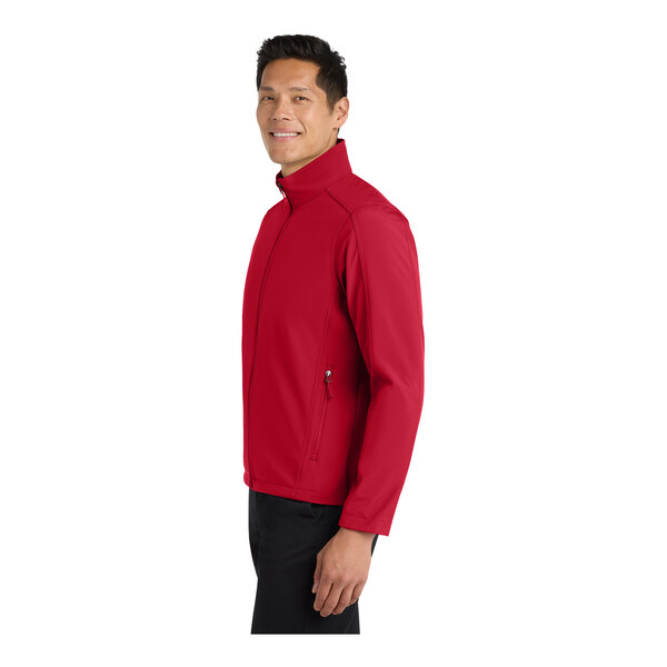 The back of a Port Authority core soft shell jacket in rich red.