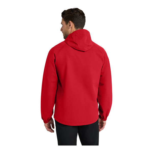 A man wearing a Port Authority red rain jacket.