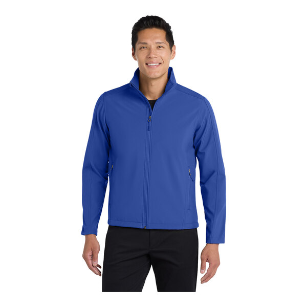 A man wearing a Port Authority Core Soft Shell jacket in true royal blue.