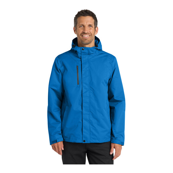 A man wearing a blue Port Authority parka jacket.