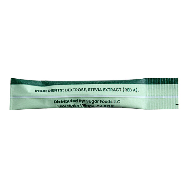 A close-up of an ecoStick Green Stevia Sugar Substitute packet with green and white labeling.