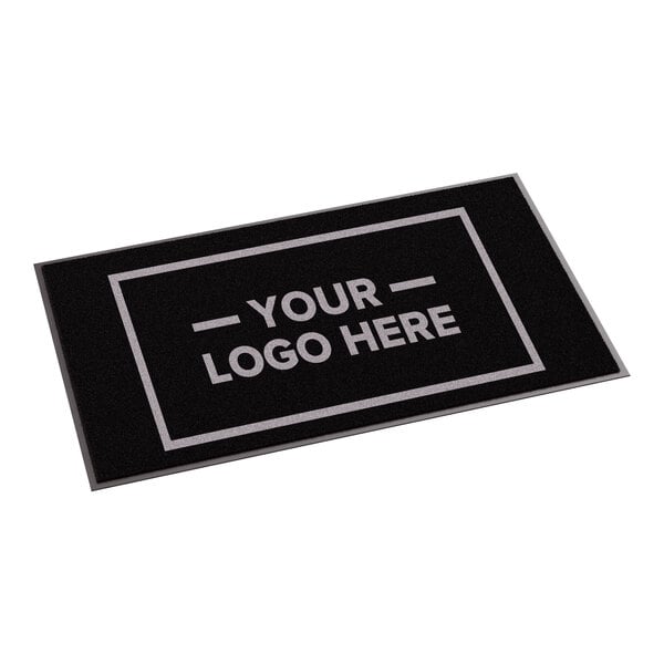 A rectangular black entrance mat with a customizable logo area, designed for indoor or outdoor use.