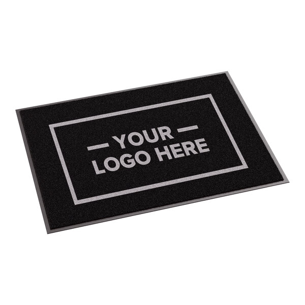 A rectangular black entrance mat with a customizable logo area, designed for indoor or outdoor use.