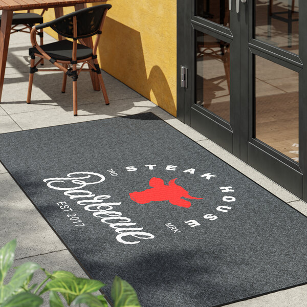 A large rectangular customizable anti-fatigue entrance mat with a steakhouse logo, suitable for indoor or outdoor use.
