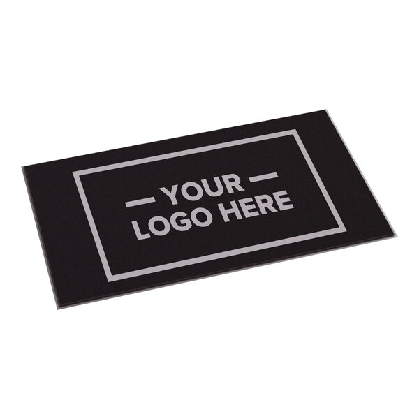 A rectangular black entrance mat with a customizable logo area, designed for indoor or outdoor use.