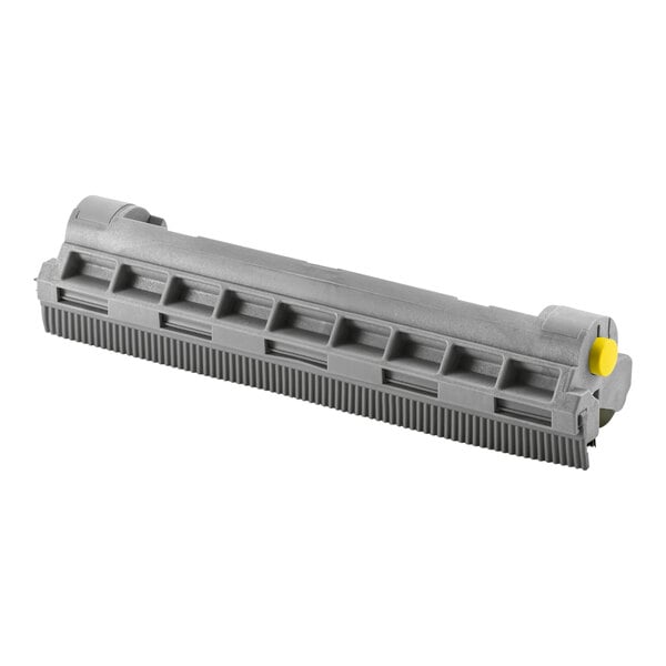 A grey plastic Karcher hard floor adapter with a yellow center and holes.