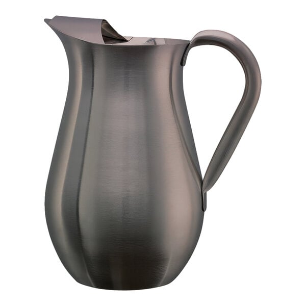 A dark tungsten stainless steel pitcher with a handle and guard.
