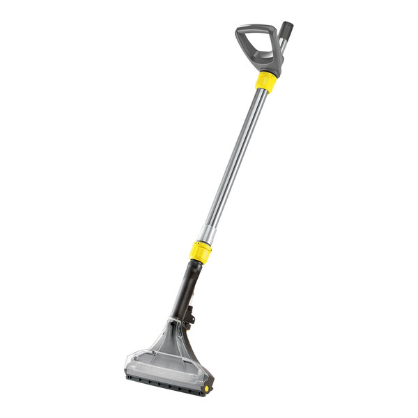 A long metal pole with a yellow handle for a Karcher Puzzi carpet extractor.