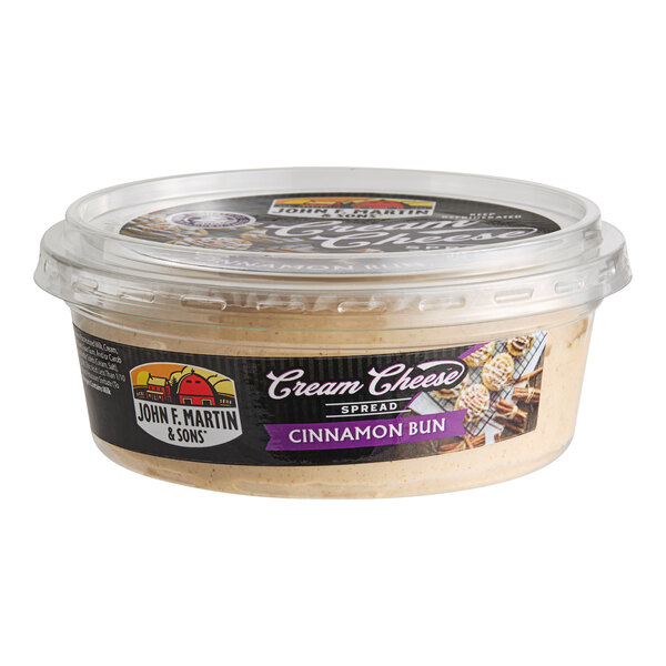 A container of John F. Martin Cinnamon Bun Cream Cheese Spread.