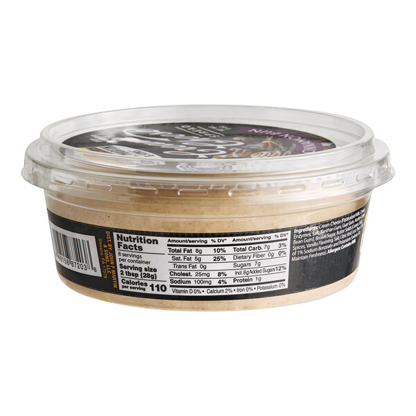 A container of John F. Martin Cinnamon Bun Cream Cheese Spread with a label.