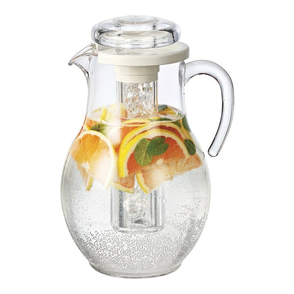 A Service Ideas SAN plastic pitcher filled with water and fruit slices.