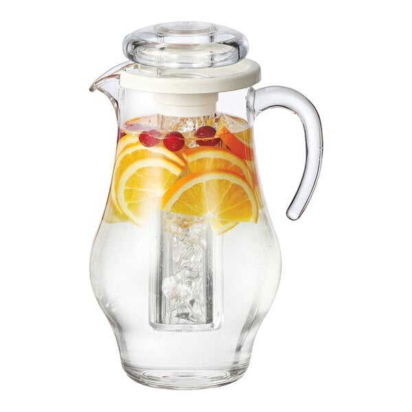 A Service Ideas Bell plastic pitcher with ice and fruit in it.