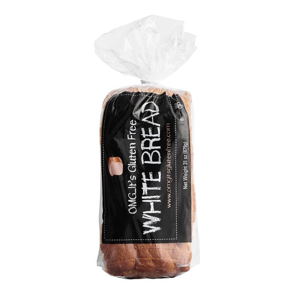A black package of OMG...It's Gluten Free Gluten-Free white bread loaves with white text on a close-up of a plastic bag.