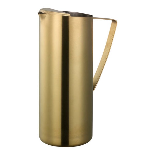 A Service Ideas gold stainless steel pitcher with a handle and guard.