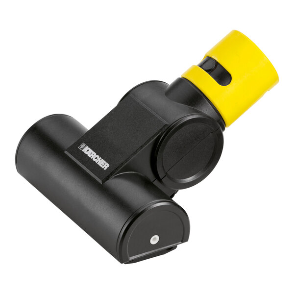 A black and yellow plastic turbo upholstery tool for a vacuum cleaner.