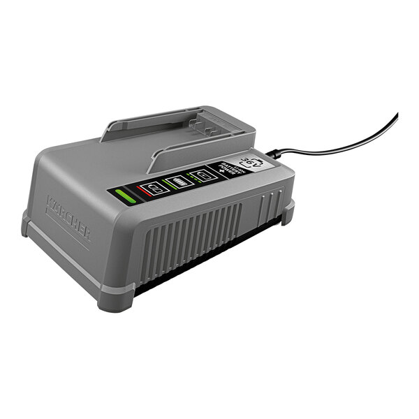 A grey Karcher battery charger with a cord and green and black text.