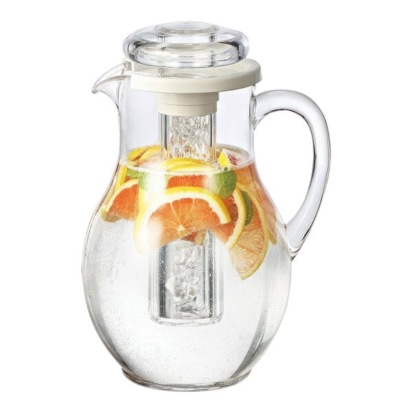 A Service Ideas plastic pitcher filled with water and slices of oranges on a white background.
