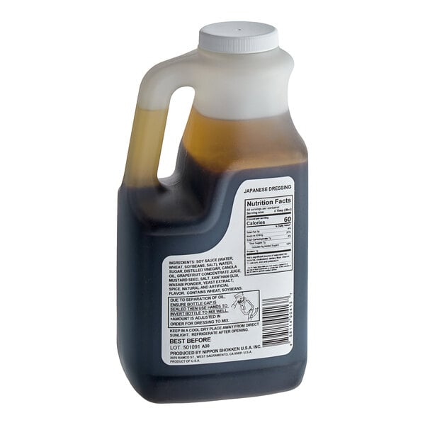 A case of six Nippon Shokken Wasabi Japanese Dressing bottles filled with brown liquid.