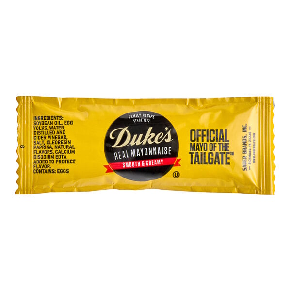 A yellow Duke's Real Mayonnaise packet with black text and a black circle with white text.