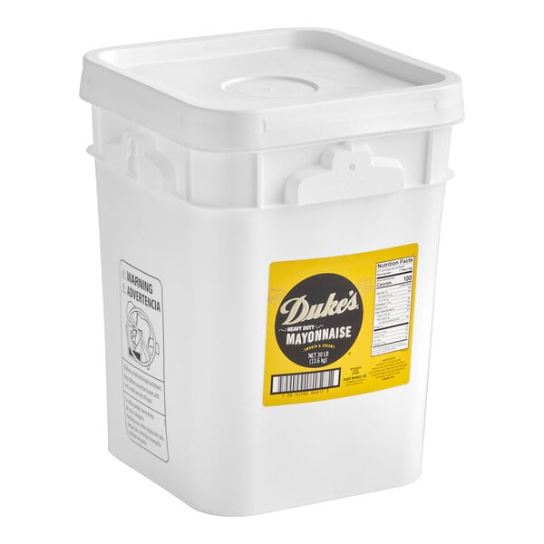 A white plastic bucket of Duke's Heavy Duty Mayonnaise with a yellow label.