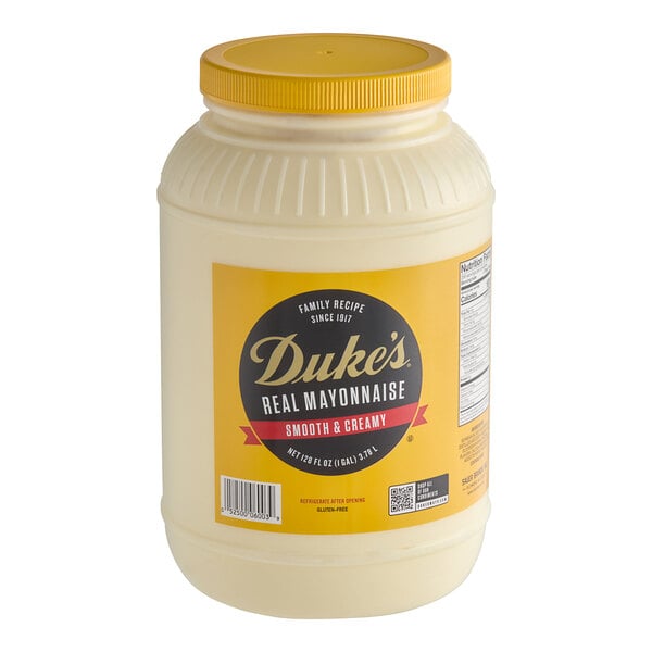 A white plastic container of Duke's Real Mayonnaise with a yellow label and lid.