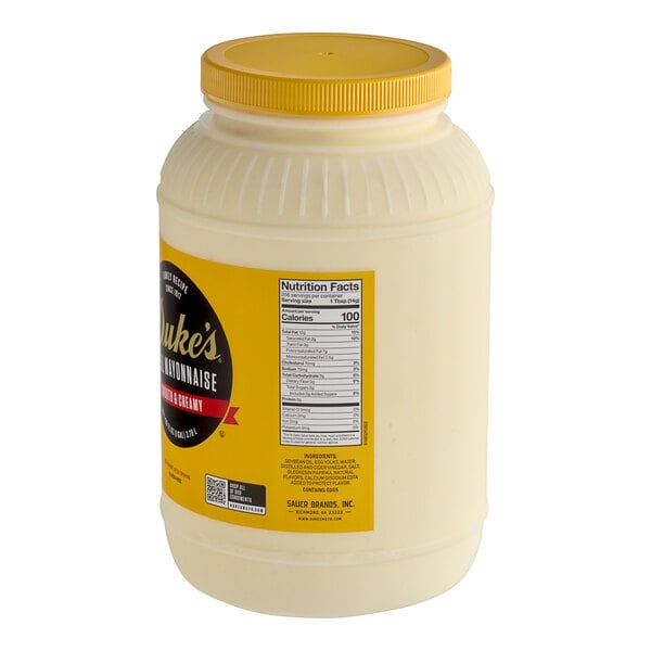 A white plastic container of Duke's Real Mayonnaise with a yellow label and lid.