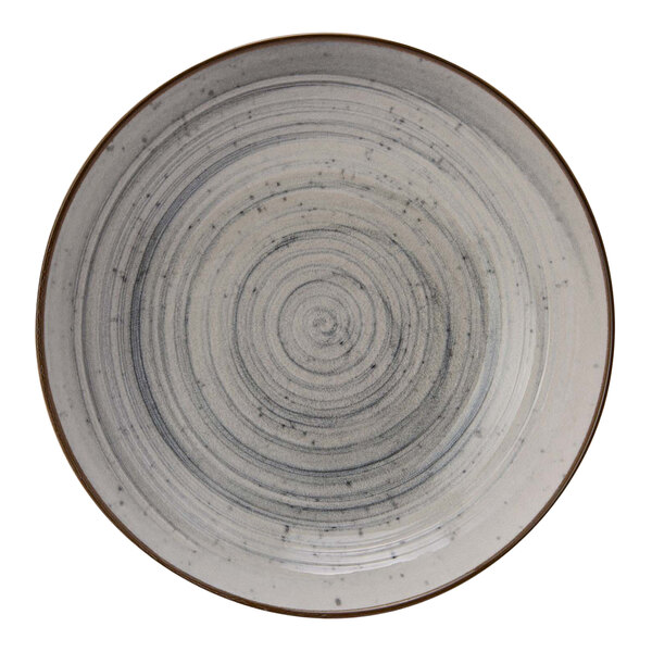 A close-up of a Cosy & Trendy Sintra dusty blue stoneware deep coupe plate with a spiral design.