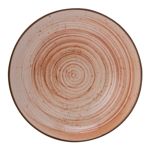 A brown terracotta stoneware deep coupe plate with an orange circular pattern on it.