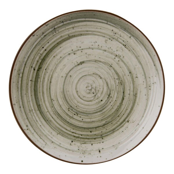 A close up of a Cosy & Trendy stoneware coupe plate with green ivy swirls.