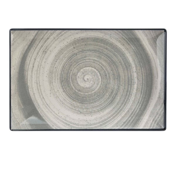 A close-up of a Cosy & Trendy gray stoneware rectangular serving platter with a grey and white swirl design.