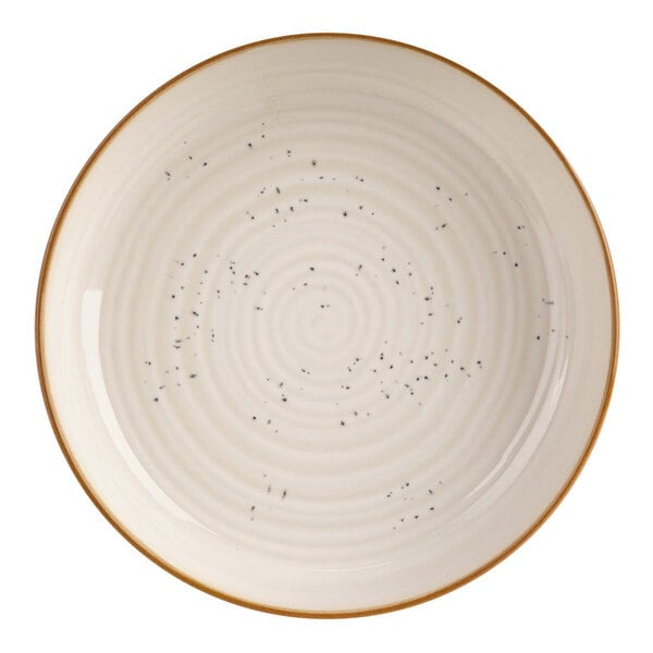 A white Cosy & Trendy stoneware bowl with a spiral pattern.