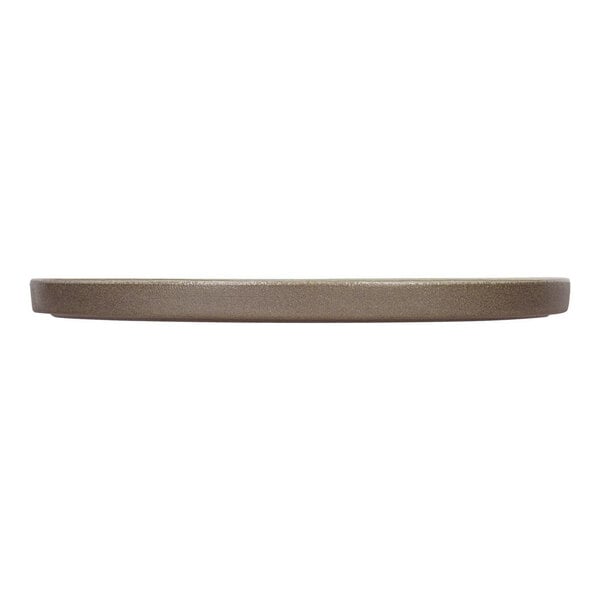 A side view of a round, flat, stoneware plate with a slightly raised edge and a matte finish.