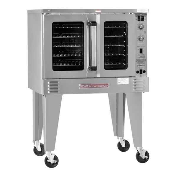 A Southbend commercial electric convection oven with a door and wheels.