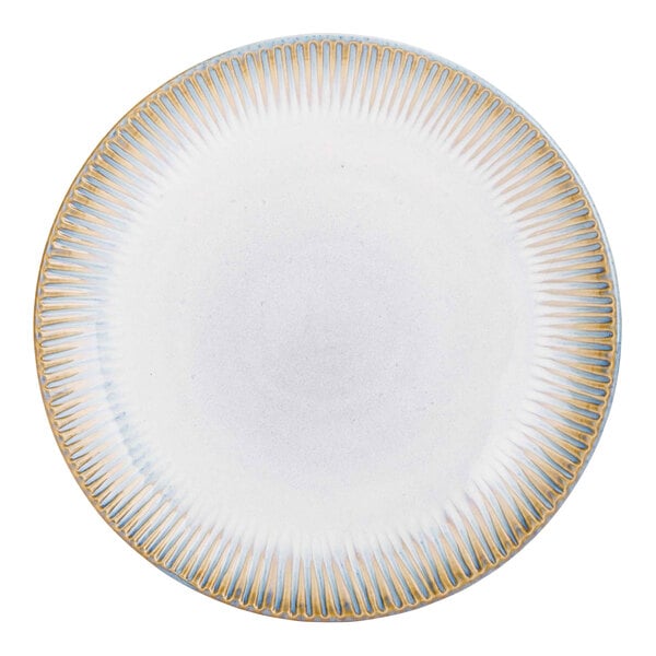 A white plate with a blue and yellow border and gold stripes on the border.