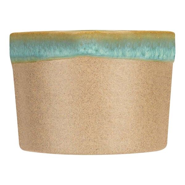 A close up of a blue and brown Cosy & Trendy Basalt stoneware ramekin.