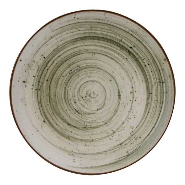A close up of a Cosy & Trendy Ivy Green stoneware plate with a spiral design.