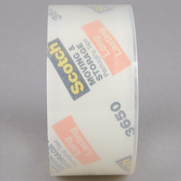 A roll of 3M Scotch clear packing tape with a label featuring blue and yellow text.